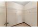 Walk-in closet with wire shelving, carpet, and neutral paint at 14555 Se 98Th Ave, Summerfield, FL 34491