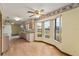 Cozy kitchen and breakfast nook featuring a bright window and wood-style flooring at 14555 Se 98Th Ave, Summerfield, FL 34491