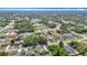 Expansive aerial view of a neighborhood with lush greenery and well-maintained single-Gathering homes on spacious lots at 15640 Sw 48 Ave, Ocala, FL 34473