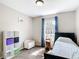 Inviting bedroom with natural light and decorative shelving at 15640 Sw 48 Ave, Ocala, FL 34473