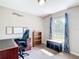 Cozy office area with a built-in desk and a window for natural lighting at 15640 Sw 48 Ave, Ocala, FL 34473