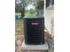 Goodman AC unit sitting on the concrete slab at 16850 Se 19Th Ct, Summerfield, FL 34491
