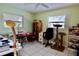 Versatile bonus room with tile flooring, multiple windows, and ample space at 16850 Se 19Th Ct, Summerfield, FL 34491