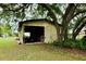 Outbuilding with room for equipment storage, a workshop or conversion into extra living space at 16850 Se 19Th Ct, Summerfield, FL 34491