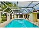 Beautiful enclosed pool area featuring a seating area at 16850 Se 19Th Ct, Summerfield, FL 34491