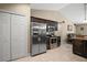 Well lit kitchen features stainless steel appliances and granite countertops at 171 Oak Cir, Ocala, FL 34472