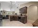 Kitchen has tile floor, granite countertops, and wooden cabinets at 171 Oak Cir, Ocala, FL 34472