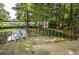 Enjoy outdoor living on this deck overlooking the tranquil waterfront and natural surroundings at 20820 River Dr # B25, Dunnellon, FL 34431