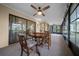 Large sunroom with views to outdoors at 21425 Sw Plantation St, Dunnellon, FL 34431