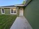 Close up of the front entrance of the home at 235 Locust Pass Ln, Ocala, FL 34472