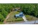An aerial view of the property and neighborhood, showing the home and its nicely sized lot at 23737 Nw Mallard Ave, Dunnellon, FL 34431