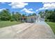 Charming single-story home with a well-manicured lawn and inviting driveway at 23737 Nw Mallard Ave, Dunnellon, FL 34431