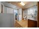 Practical laundry area featuring appliances, new flooring, and built-in shower at 23737 Nw Mallard Ave, Dunnellon, FL 34431