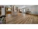 The living room features an open floor plan, laminate floors, and access to other rooms at 23737 Nw Mallard Ave, Dunnellon, FL 34431