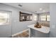 Dining area with an accent mirror, dining table, and lots of natural light at 3250 Sw 46Th Ave, Ocala, FL 34474