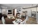 Open-concept living area with dining space, and kitchen, perfect for entertaining guests at 3250 Sw 46Th Ave, Ocala, FL 34474