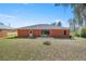 Spacious backyard with a patio and well-maintained lawn at 3792 Sw 152Nd Ct, Ocala, FL 34481