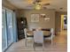 Bright dining area featuring modern decor, a round table with chairs, and sliding glass doors at 4513 Nw 30Th Pl, Ocala, FL 34482