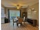 Bright dining area featuring modern decor, a round table with chairs, and sliding glass doors at 4513 Nw 30Th Pl, Ocala, FL 34482