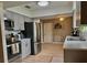 Modern kitchen featuring stainless steel appliances, gray cabinets, stylish countertops, and contemporary fixtures at 4513 Nw 30Th Pl, Ocala, FL 34482