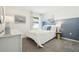 Cozy bedroom with a soft color palette, natural lighting, and carpeted floor at 4690 Sw 88Th Ln, Ocala, FL 34476
