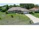 An aerial view of the beautiful single-story home with lush green lawn and well-maintained landscaping at 5420 Sw 86Th Ln, Ocala, FL 34476