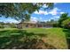 Large backyard featuring a screened-in pool area, providing a perfect blend of leisure and privacy at 5420 Sw 86Th Ln, Ocala, FL 34476