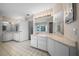 Large bathroom vanity with double sinks, lots of cabinets, and a large mirror at 5420 Sw 86Th Ln, Ocala, FL 34476