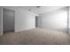 Spacious bedroom with carpeted flooring, closet, and neutral walls for a relaxing atmosphere at 5420 Sw 86Th Ln, Ocala, FL 34476
