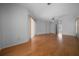 Bright bedroom with wood floors, ceiling fan and sliding doors at 5420 Sw 86Th Ln, Ocala, FL 34476