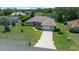 Charming single-story home with a two-car garage, a long driveway, well-kept lawn, and mature landscaping at 5420 Sw 86Th Ln, Ocala, FL 34476