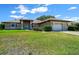 Charming single-story home with a manicured lawn, beautiful landscaping, and inviting curb appeal at 5420 Sw 86Th Ln, Ocala, FL 34476