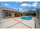 Enjoy a beautiful pool inside a screened enclosure offering the ultimate in relaxation and entertainment at 5420 Sw 86Th Ln, Ocala, FL 34476