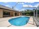 Enjoy a beautiful pool inside a screened enclosure offering the ultimate in relaxation and entertainment at 5420 Sw 86Th Ln, Ocala, FL 34476