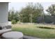 Expansive backyard with lush green grass and a privacy fence, perfect for outdoor activities at 5515 Se 91St St, Ocala, FL 34480