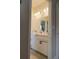 Stylish bathroom featuring double sink vanity with shaker cabinets, ample lighting and modern fixtures at 5515 Se 91St St, Ocala, FL 34480