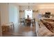 Dining room with contemporary light fixtures and kitchen access at 5515 Se 91St St, Ocala, FL 34480
