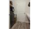 Well-organized laundry room with washer, dryer, and storage space at 5515 Se 91St St, Ocala, FL 34480