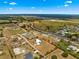 Aerial view showcasing the home's location with beautiful surrounding landscape at 6045 Se 99Th Pl, Belleview, FL 34420