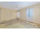 Bright bedroom featuring multiple windows and neutral walls, ready for personalization at 608 Se 31St Ter, Ocala, FL 34471