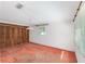 Bedroom with wooden closets and painted brick walls at 608 Se 31St Ter, Ocala, FL 34471