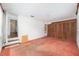 Bedroom with wooden closets and painted brick walls at 608 Se 31St Ter, Ocala, FL 34471