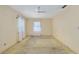 Cozy bedroom with a ceiling fan and window coverings, perfect for relaxation at 608 Se 31St Ter, Ocala, FL 34471