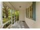 Covered porch, great for relaxing outdoors and sheltered from the elements at 608 Se 31St Ter, Ocala, FL 34471
