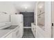 Quaint kitchen area featuring a stove and refrigerator, exuding a retro charm at 608 Se 31St Ter, Ocala, FL 34471