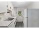 Functional kitchen with white appliances and ample cabinet space at 608 Se 31St Ter, Ocala, FL 34471