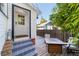 Outdoor deck area with tiled stairs and a wood-burning fire pit for entertaining at 716 Se Wenona Ave, Ocala, FL 34471