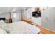 Large bedroom with raised platform, TV and closet space, bathed in natural light at 716 Se Wenona Ave, Ocala, FL 34471