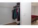 Walk-in closet offers ample storage space with shelving and hanging racks at 8443 Sw 109Th Place, Ocala, FL 34481