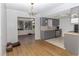 Bright kitchen featuring gray cabinets and tile flooring at 8443 Sw 109Th Place, Ocala, FL 34481
